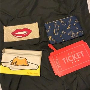 4 piece Ipsy makeup bags
